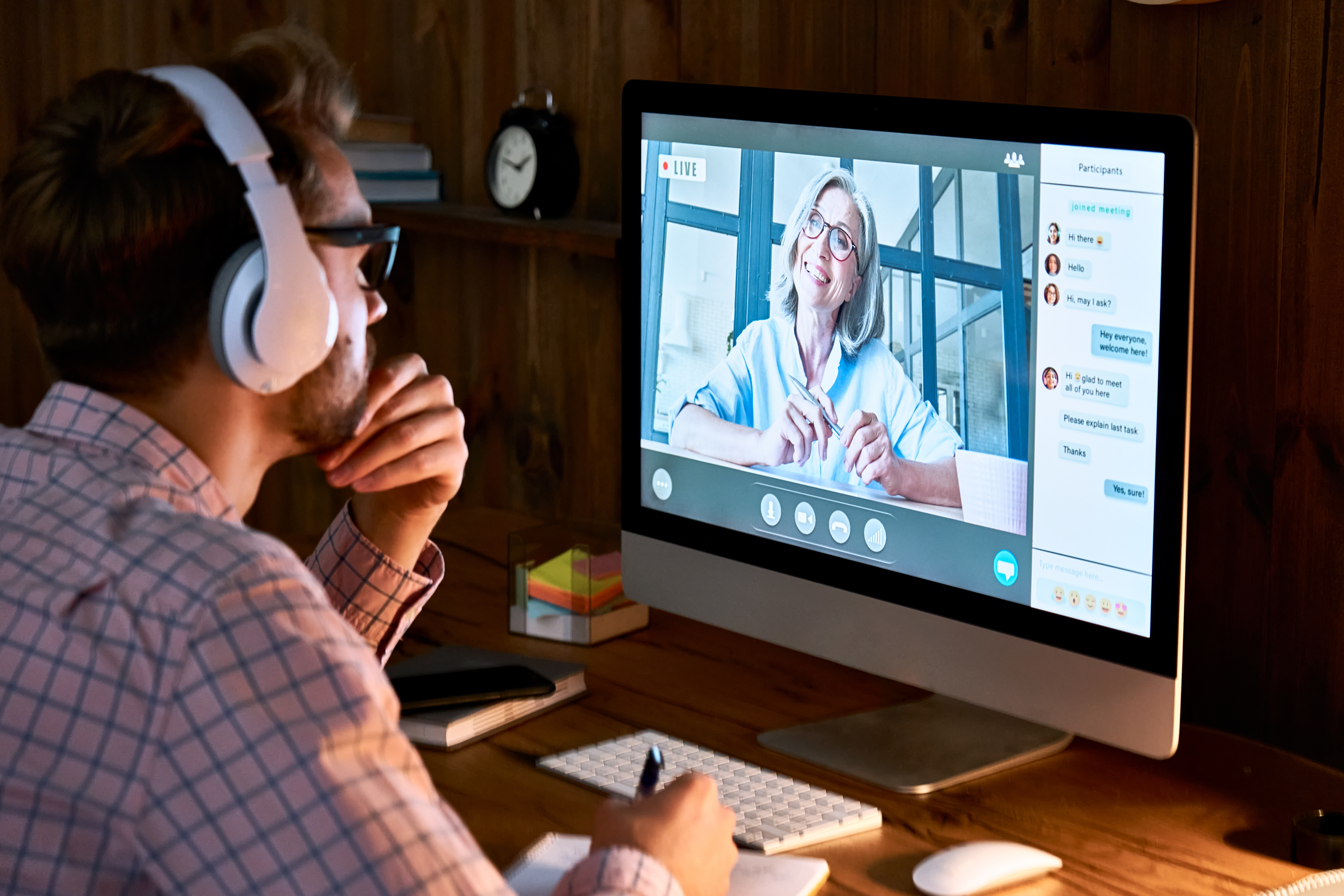 A prospective registered behavior technician takes notes while attending a live video training course from Behaviorly.